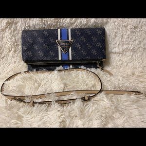 Guess two-way bag can be worn as clutch or crossbody.